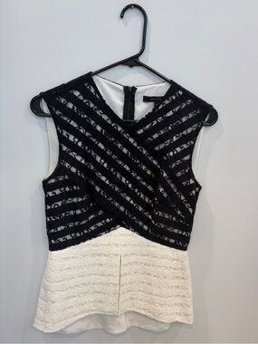 BCBGMaxAzria Black and White Lace Peplum Top